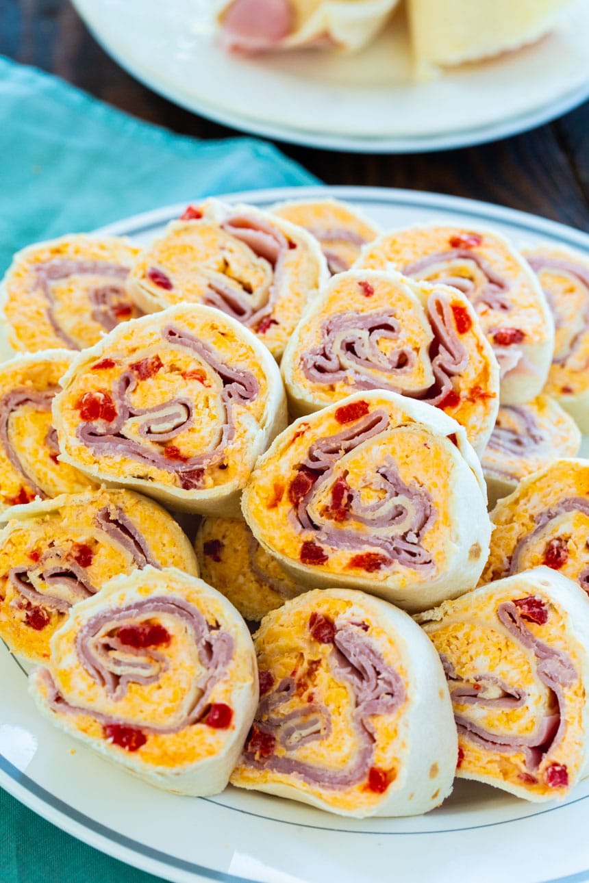 Pimento cheese and ham rolled up in flour tortillas
