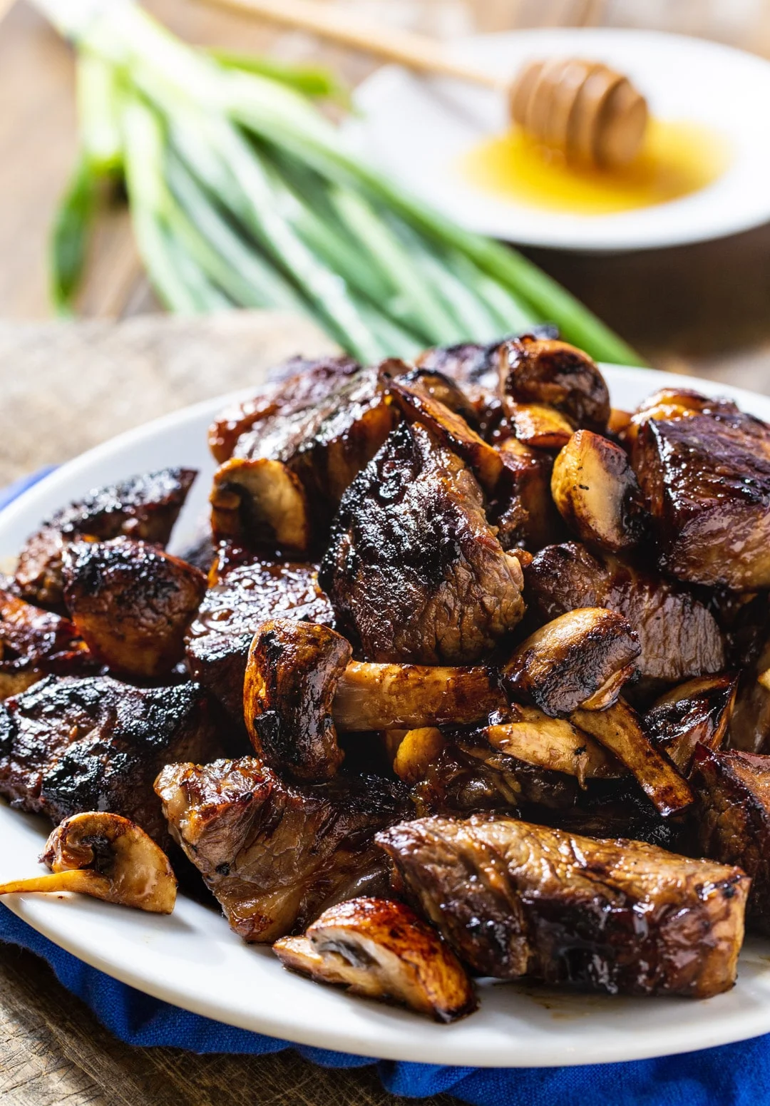 Steak Bites with Mushrooms on a plate.