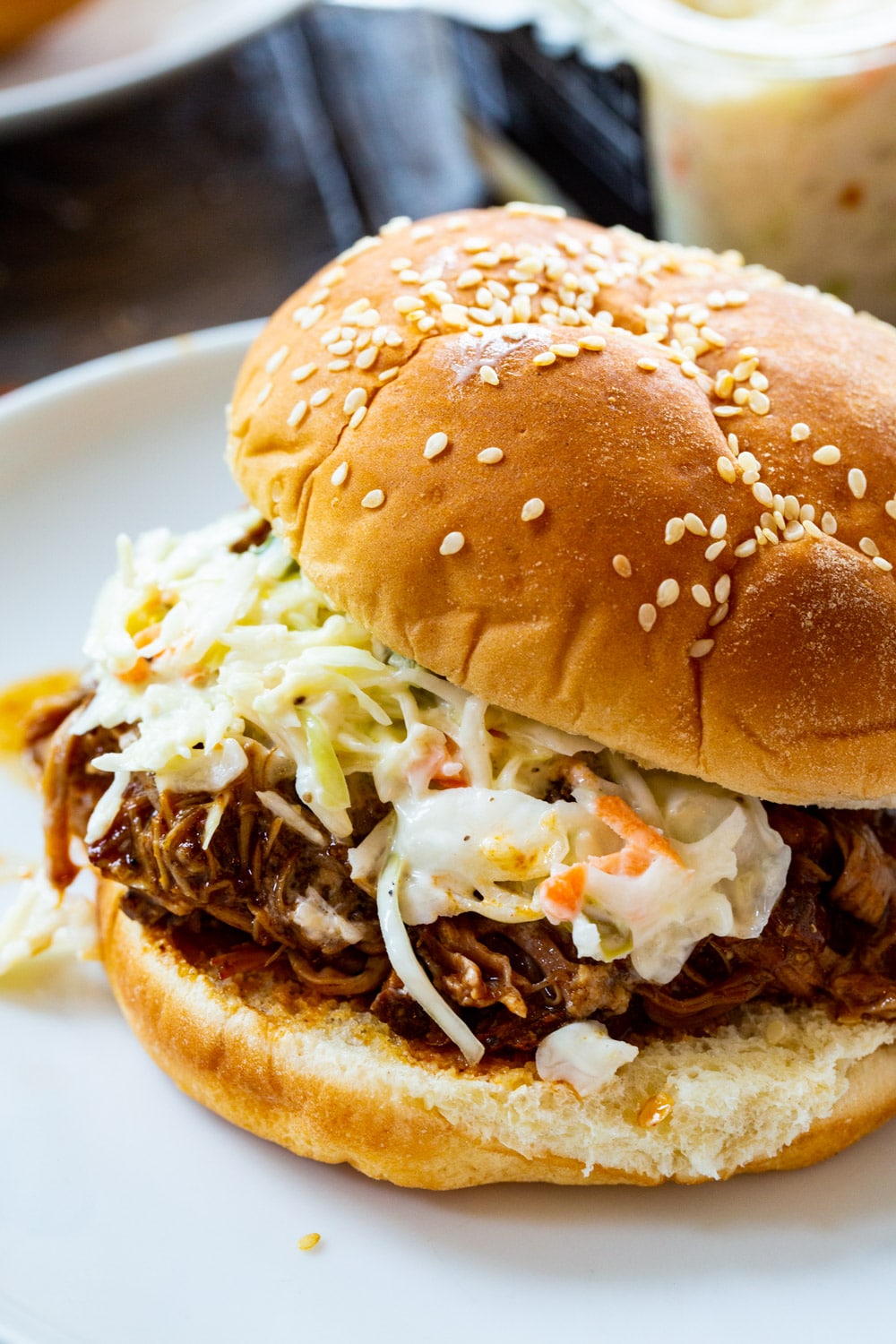 Pulled Pork on a bun with coleslaw.