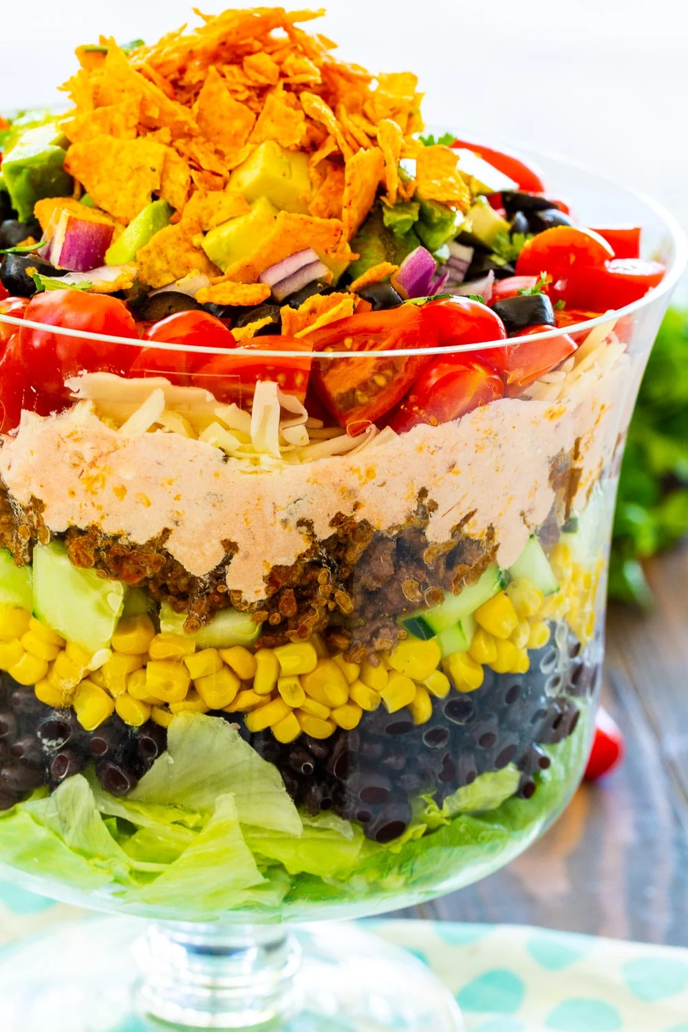 Close-up of Layered Taco Salad showing the layers.