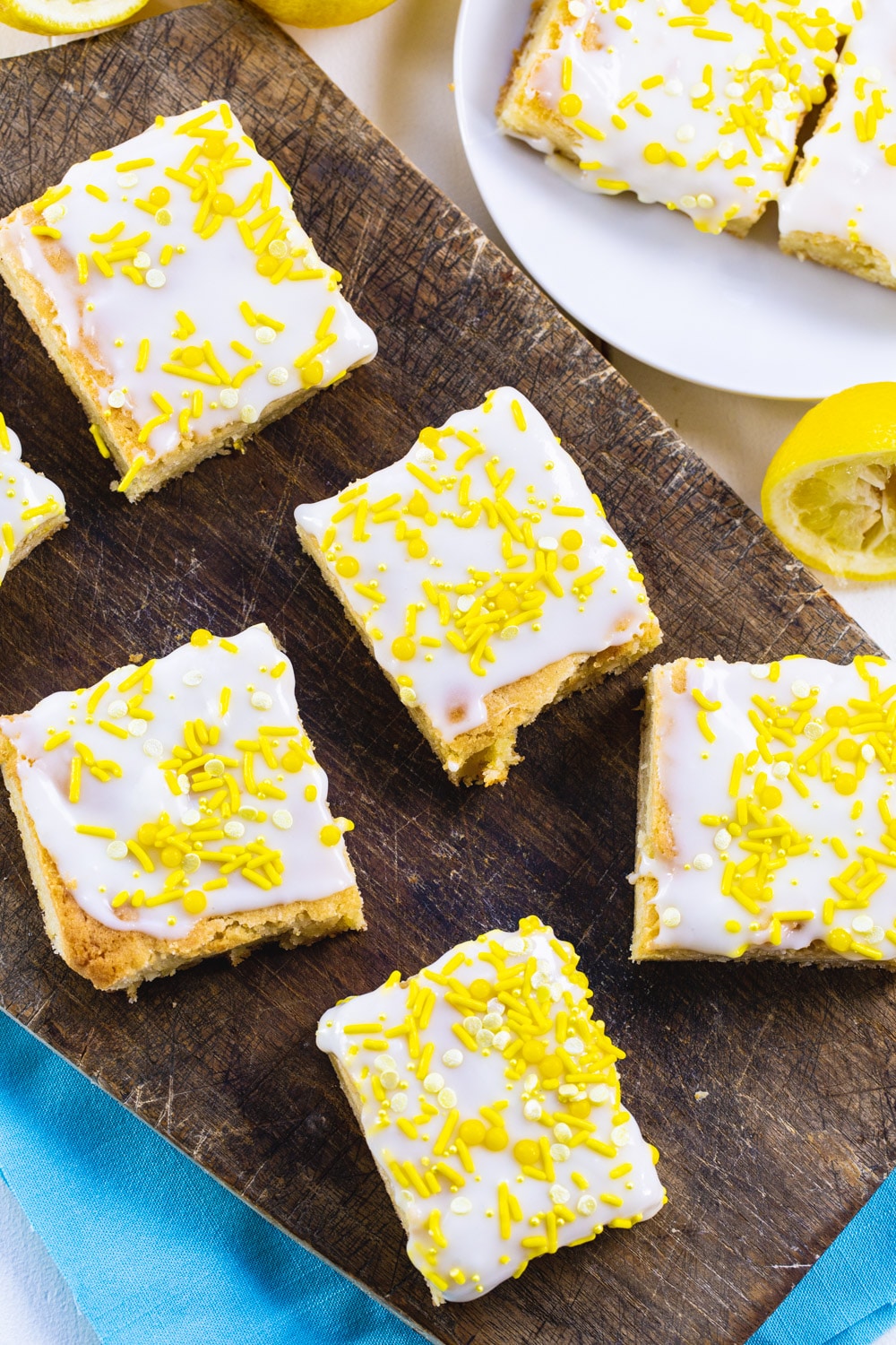 Overhead of Lemon Cookie Bars on a wood board.