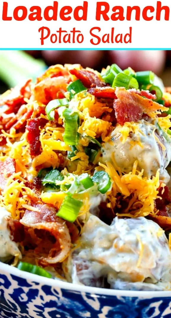 Potato salad in a blue and white bowl.