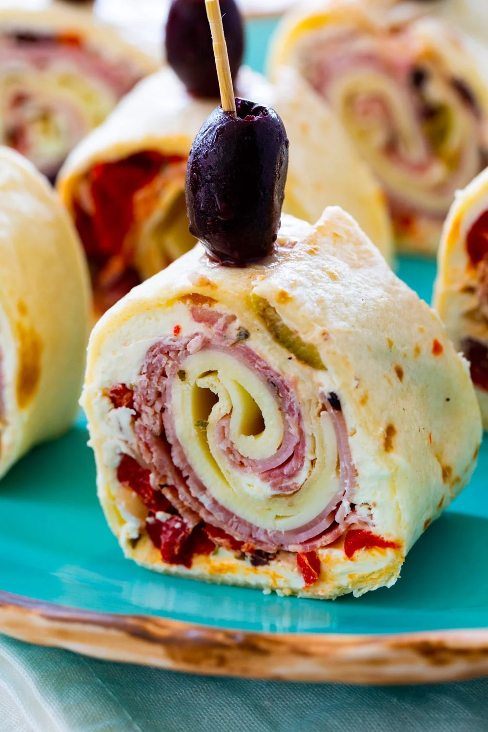 Close-up of a Muffaletta Pinwheel.