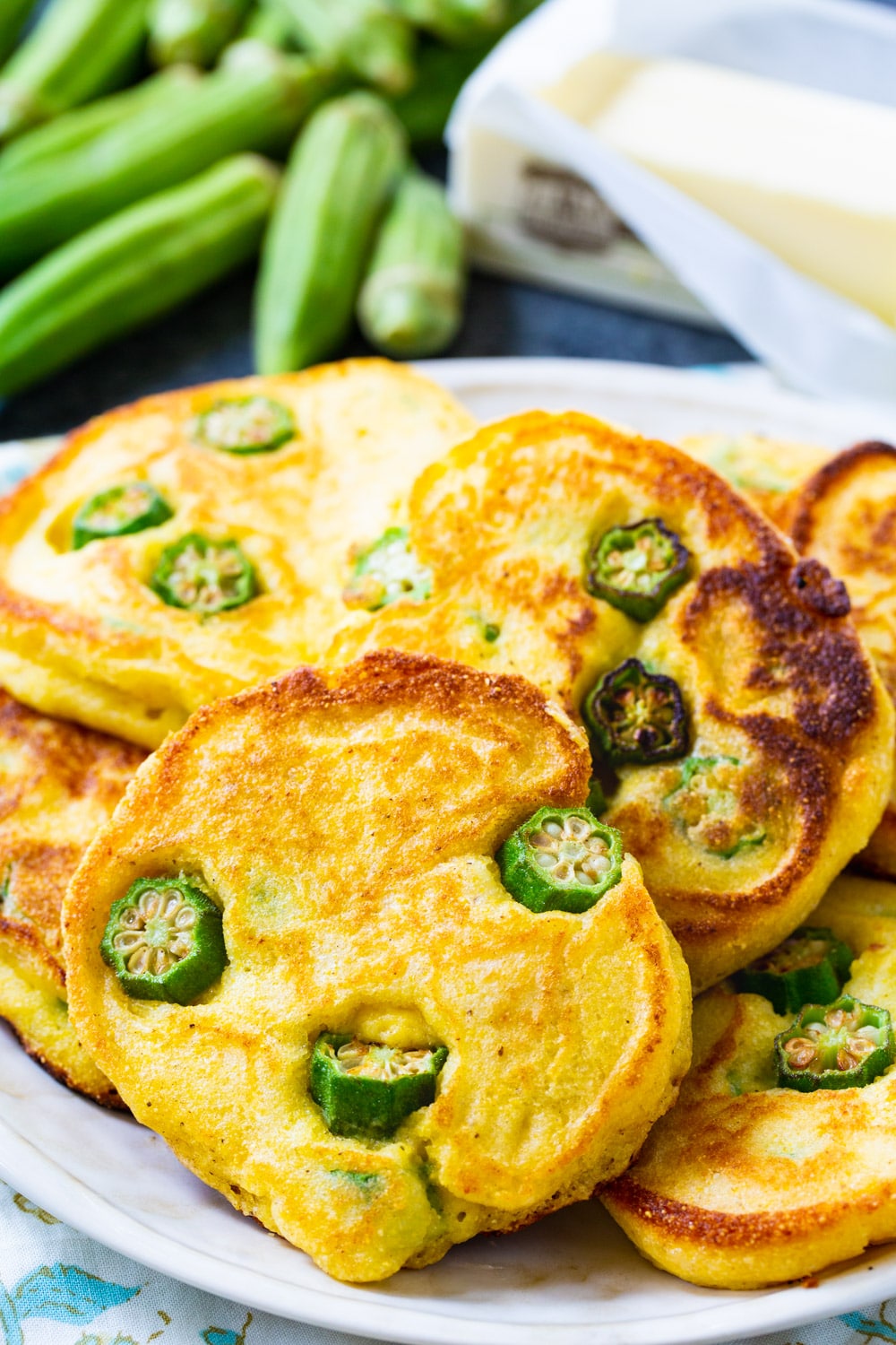 Okra Hoecakes piled up on plate.