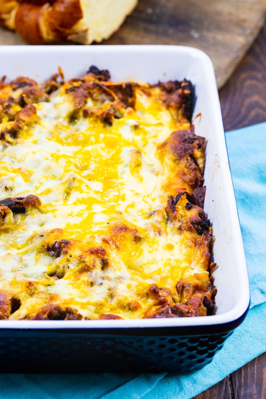 Sausage and Caramelized Breakfast Casserole in blue baking dish.