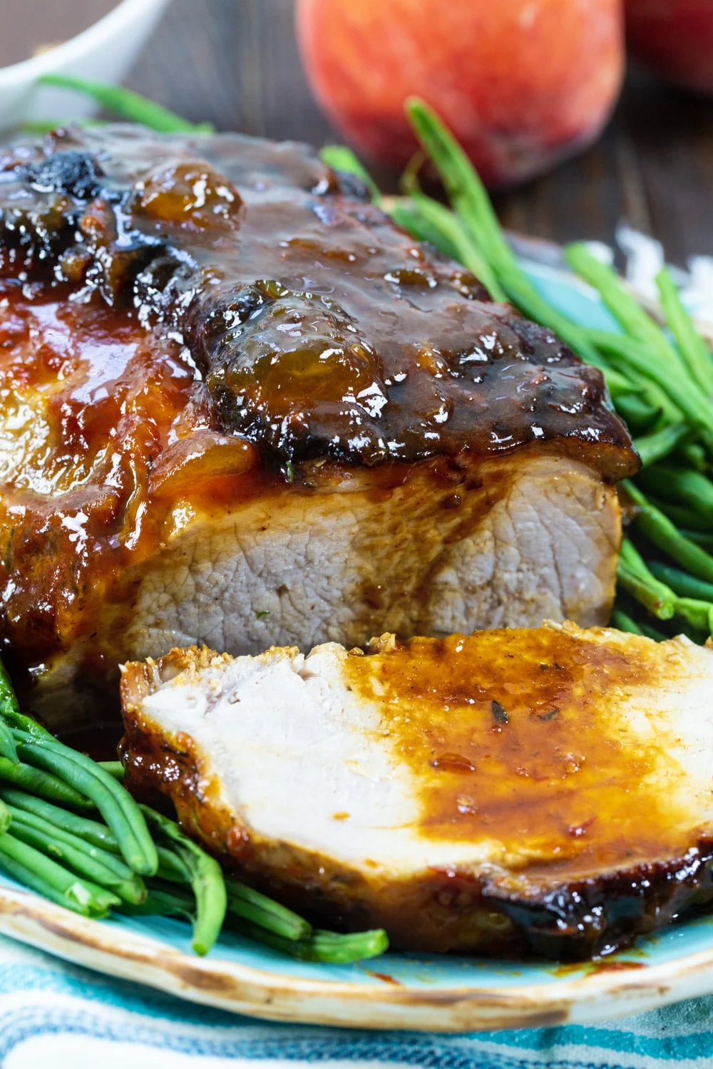 Peach Glazed Pork Roast with a slice cut.