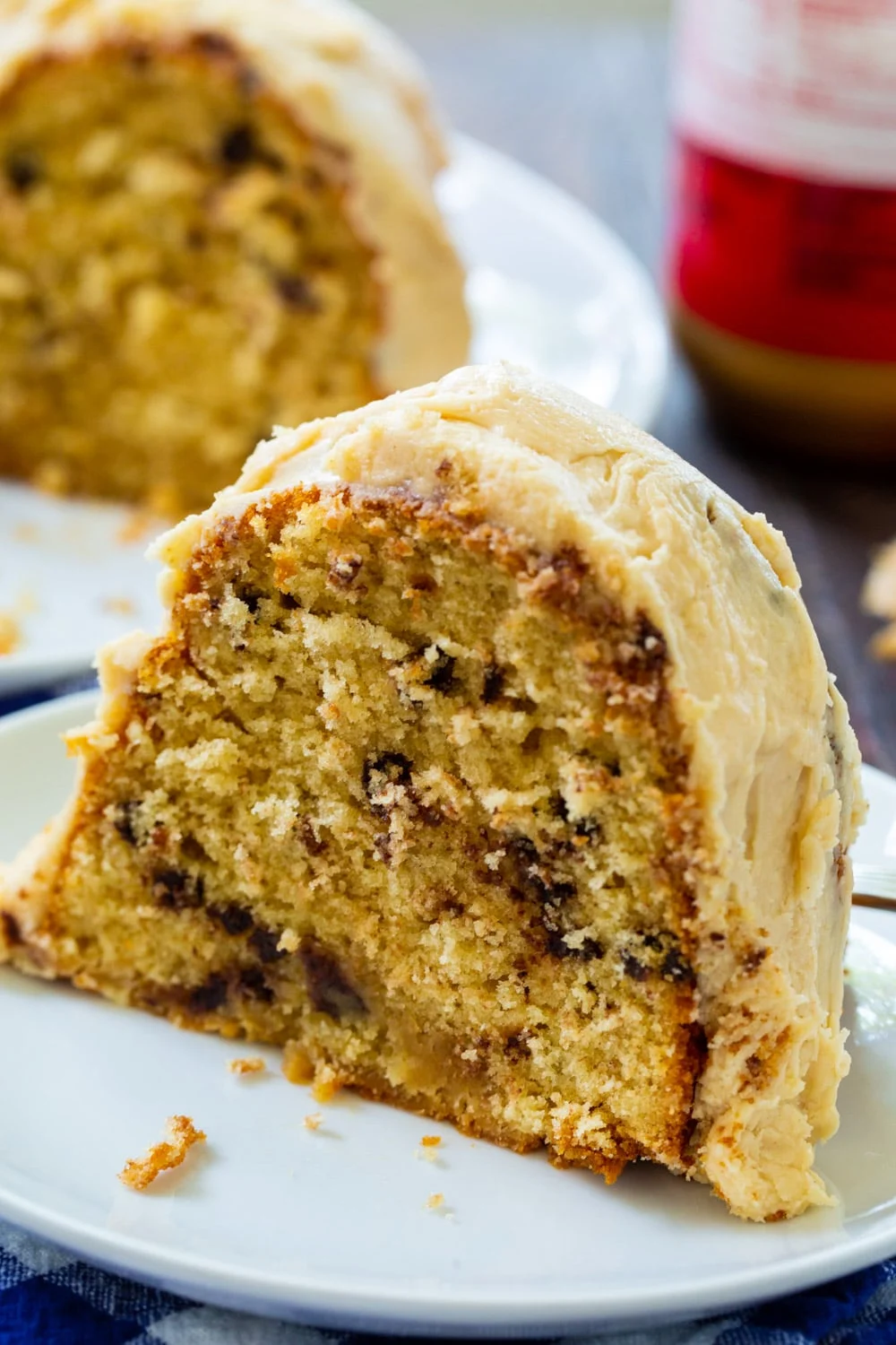 Slice of Peanut Butter Bundt Cake on a plate.