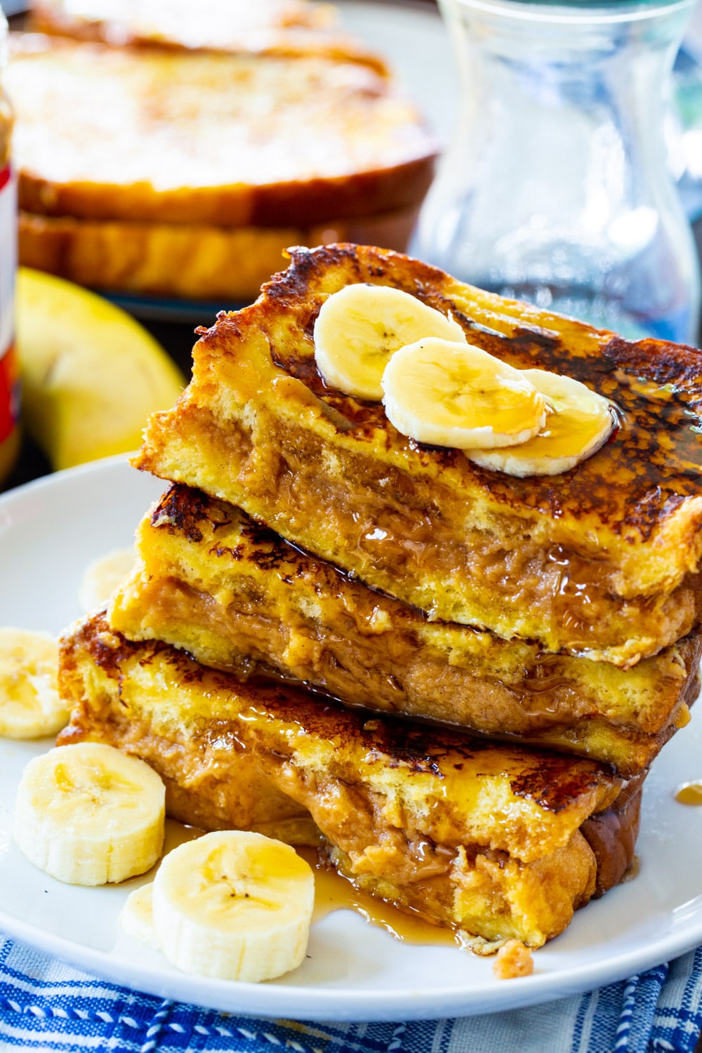 French Toast stuffed with peanut butter on a plate.
