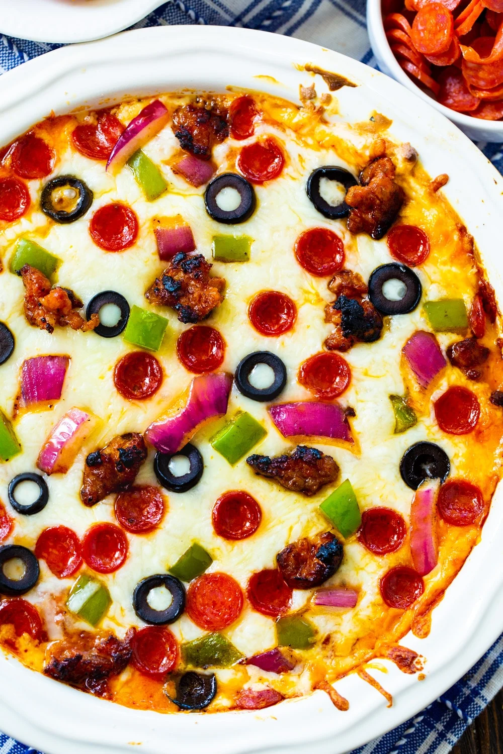 Pizza Dip in a white pie plate.