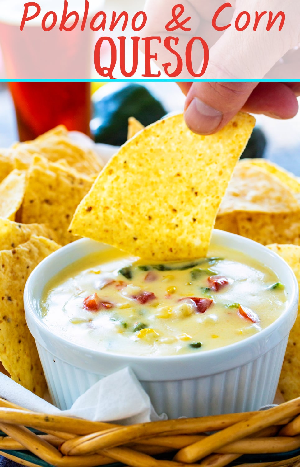 Chip scooping up queso.