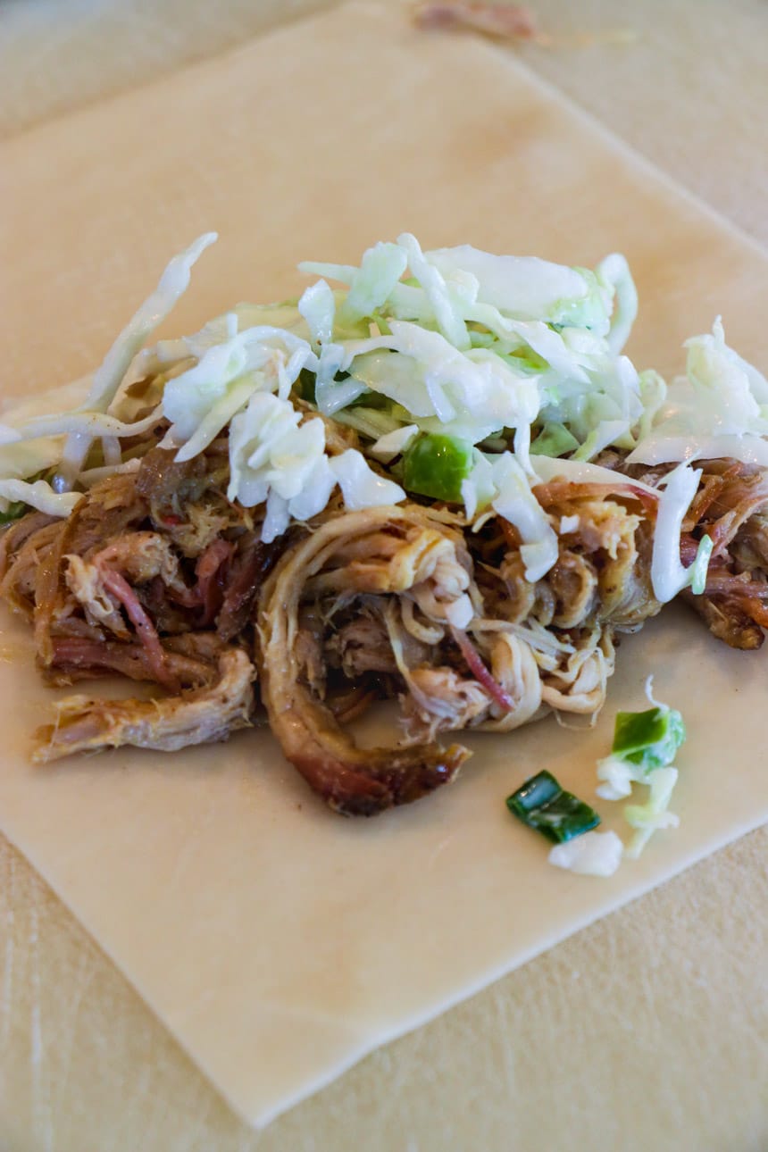 Pulled pork and coleslaw on egg roll wrapper.