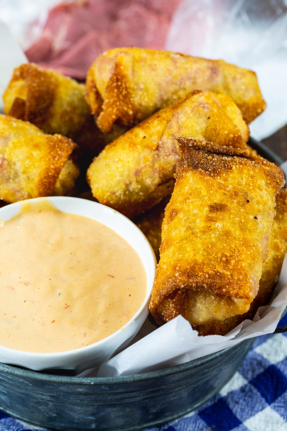 Egg Rolls in a metal serving dish.