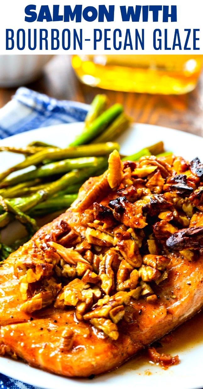 close-up of Salmon with Bourbon-Pecan Glaze and asparagus on a white plate
