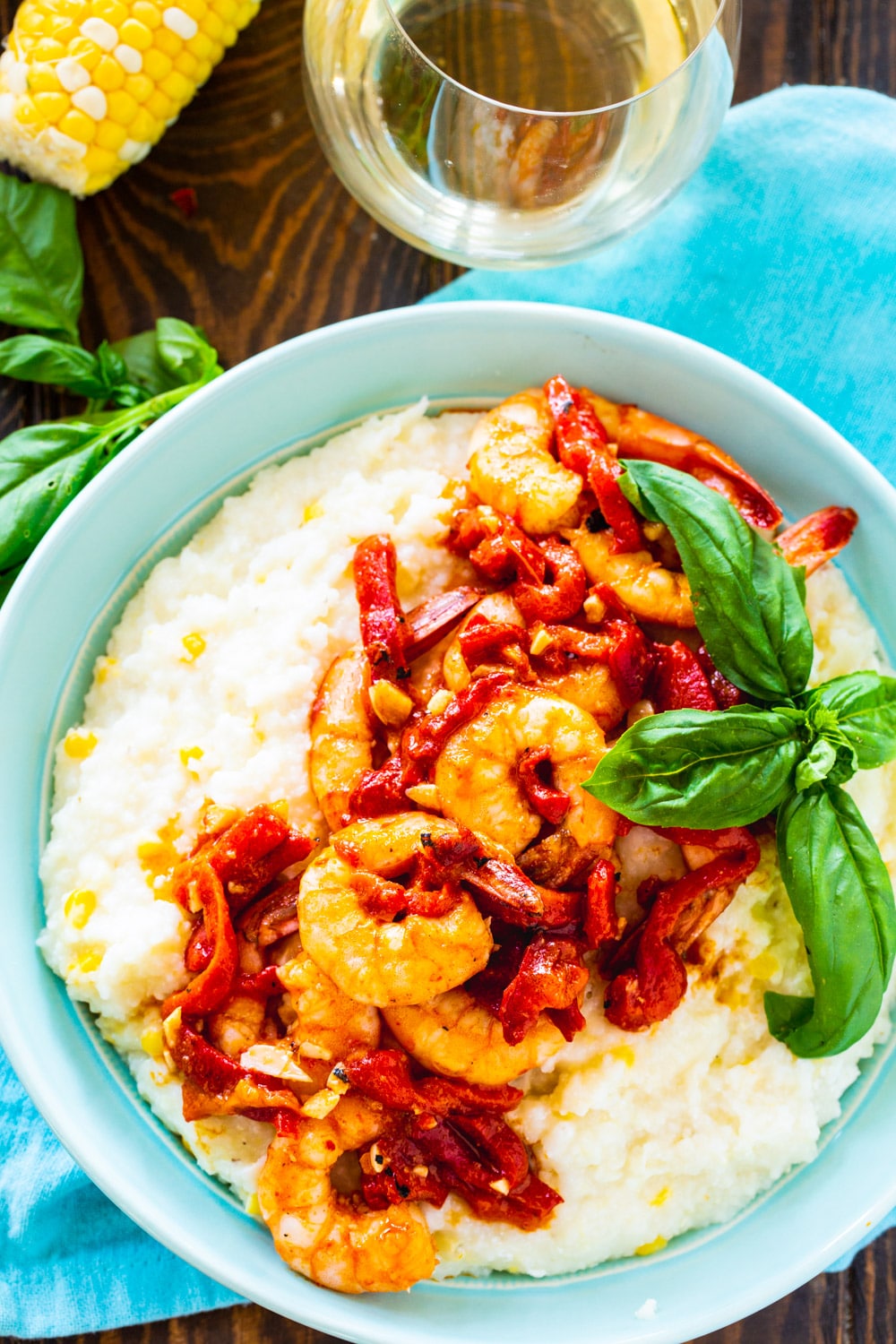 Shrimp and Grits in a light blue bowl.
