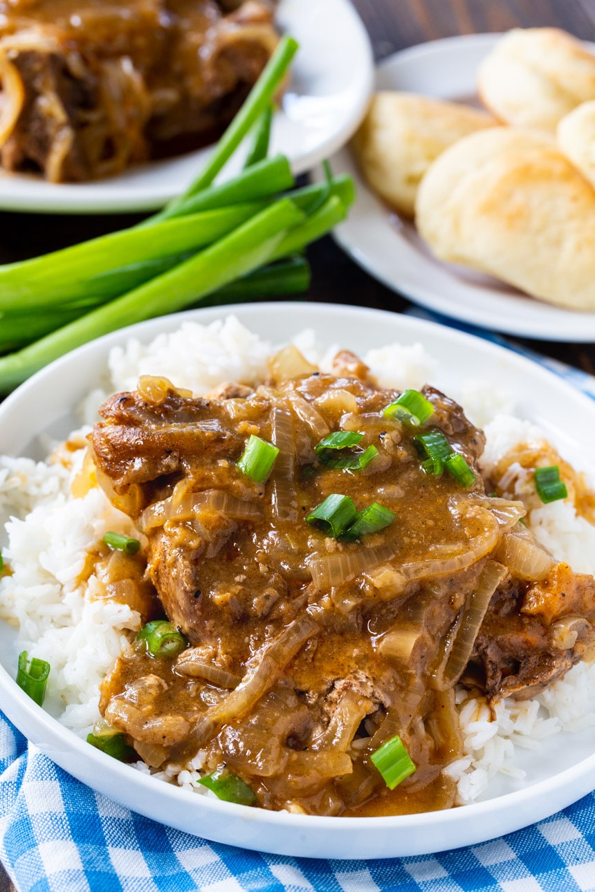 Smothered Pork Chops cooked in a crock pot
