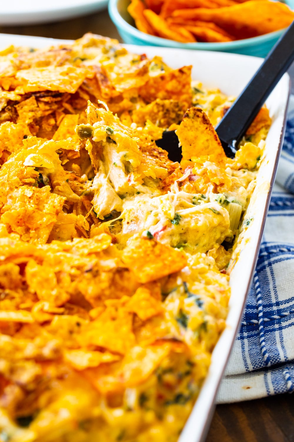 Spoon scooping Southwestern Turkey Casserole.