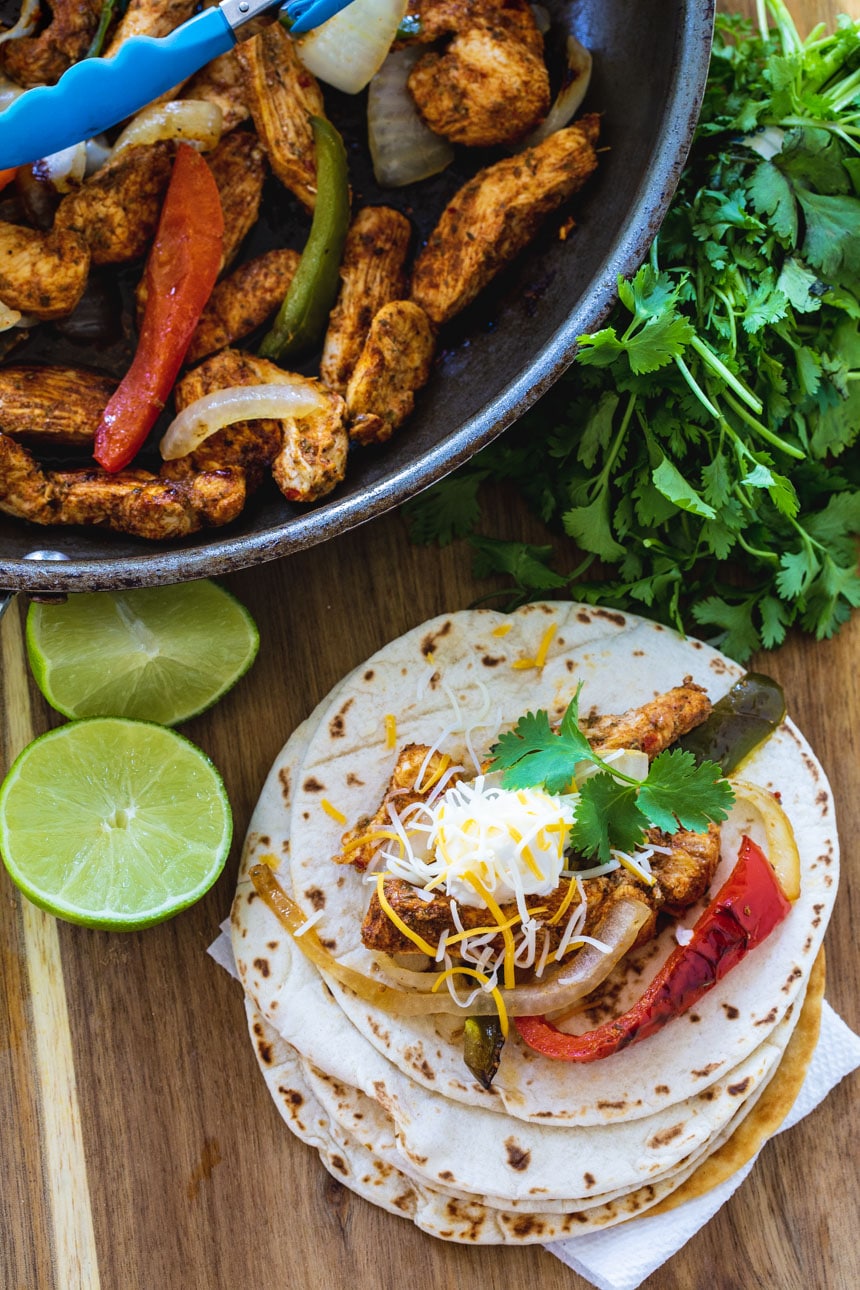 Chicken Fajita on flour tortilla with cilantro.