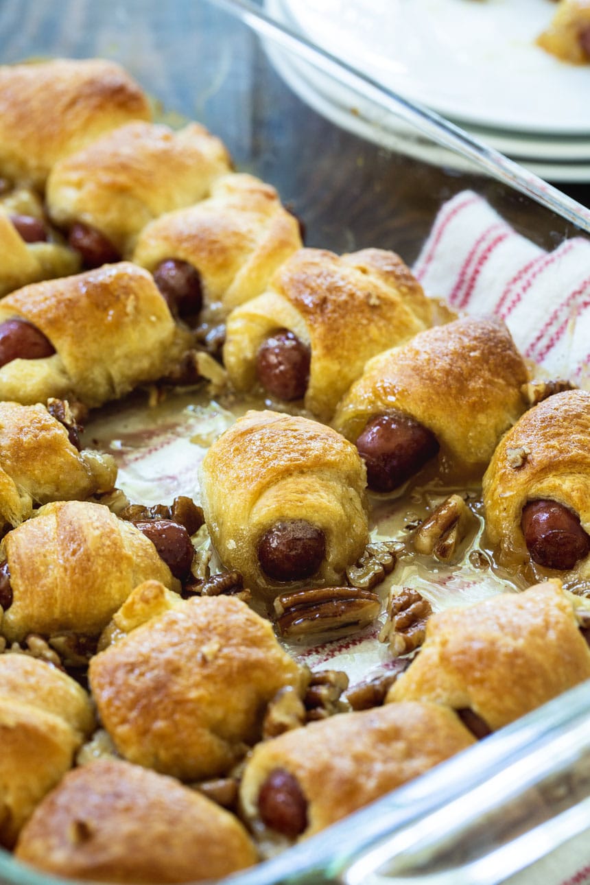 Little Smokies wrapped with crescent rolls in a baking dish