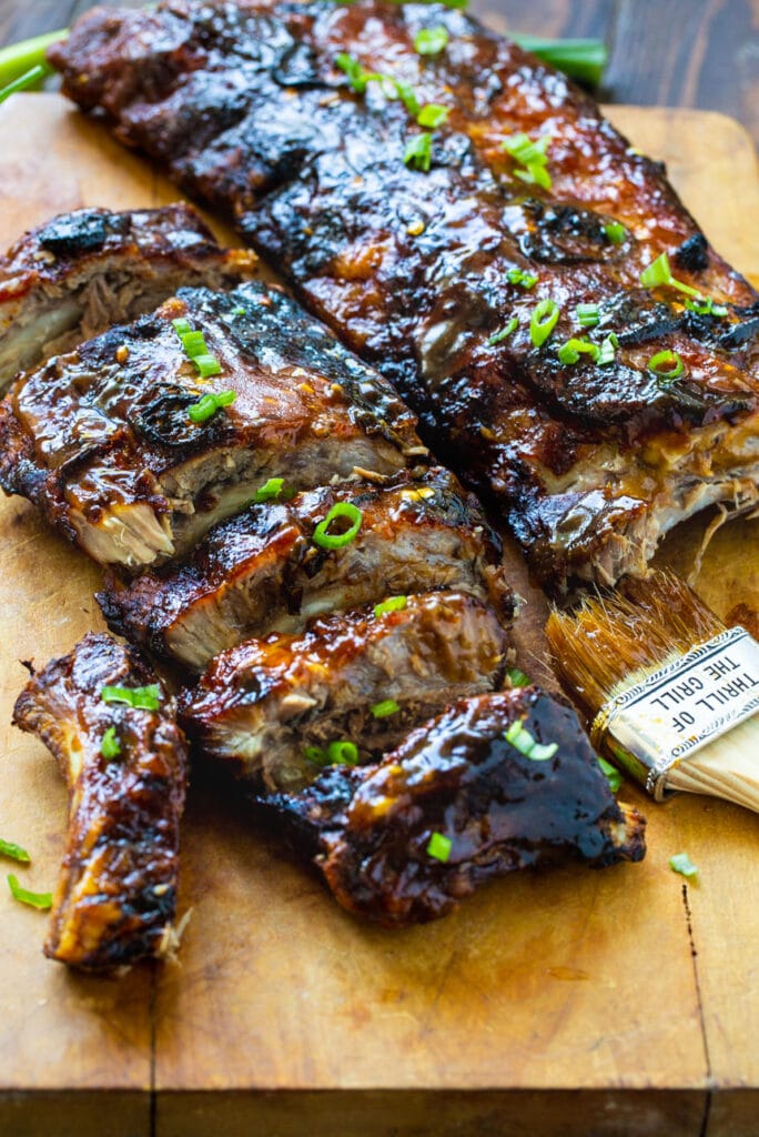 Sweet and Sour Baby Back Ribs on a cutting board.