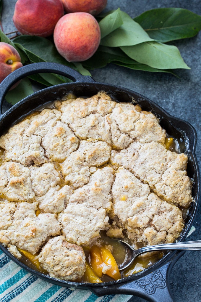 Skillet Bourbon Peach Cobbler with Cinnamon Sugar Dumpling