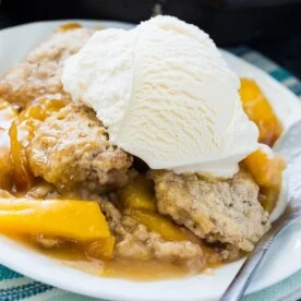 Skillet Bourbon Peach Cobbler with Cinnamon Sugar Dumplings