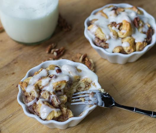 Cinnamon Roll Bread Pudding with a bite eaten.