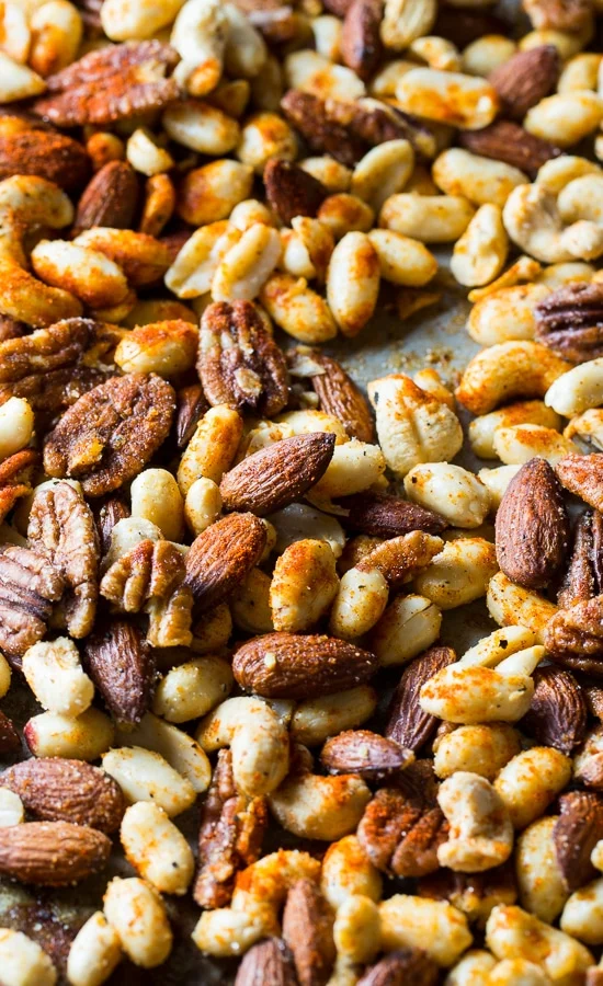 Cajun Nuts - make a great party snack or holiday appetizer. Flavored with plenty of spices, some sugar, and bacon grease!