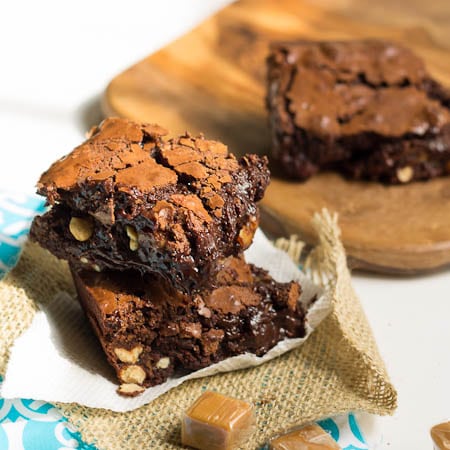 Two Caramel Brownies stacked on top of each other.