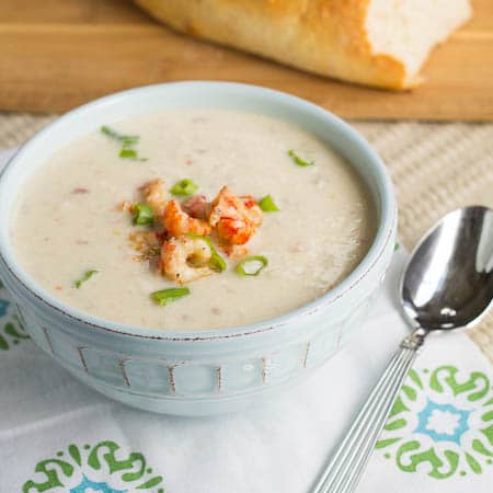 Crawfish Cauliflower Soup in a light blue bowl.