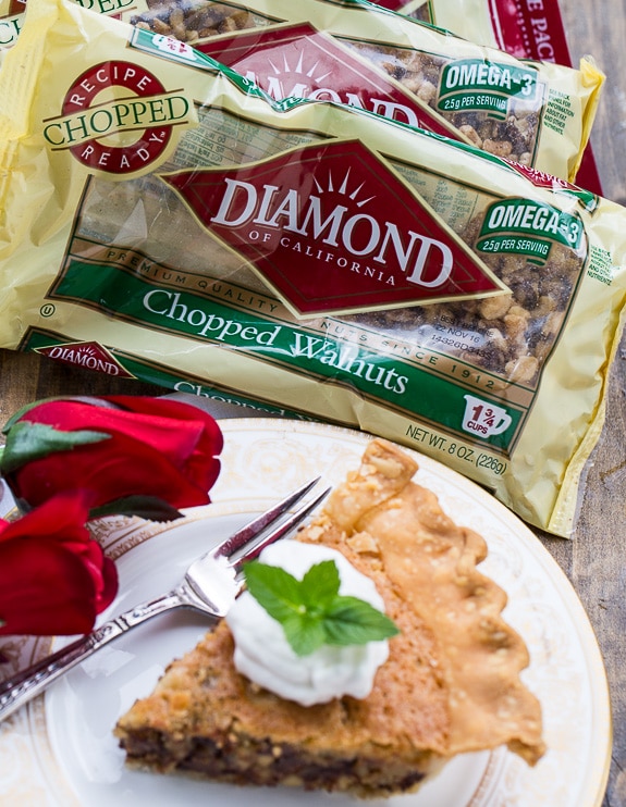 Kentucky Derby Pie has a gooey chocolate and walnut filling with a splash of bourbon. Top with bourbon whipped cream for a delicious southern dessert.