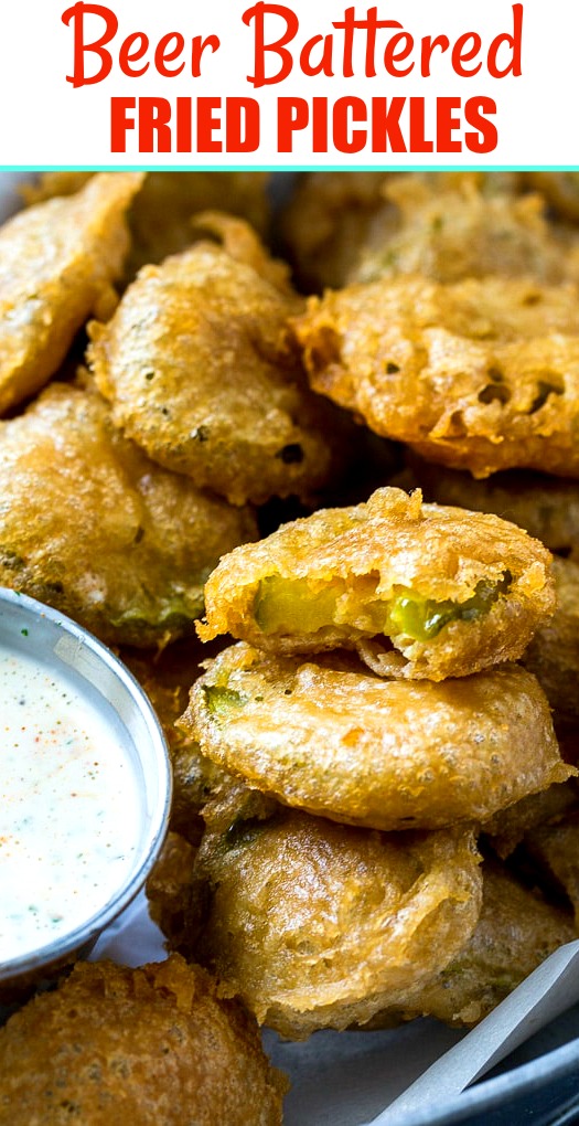 Close-up of fried pickles with dipping sauce.