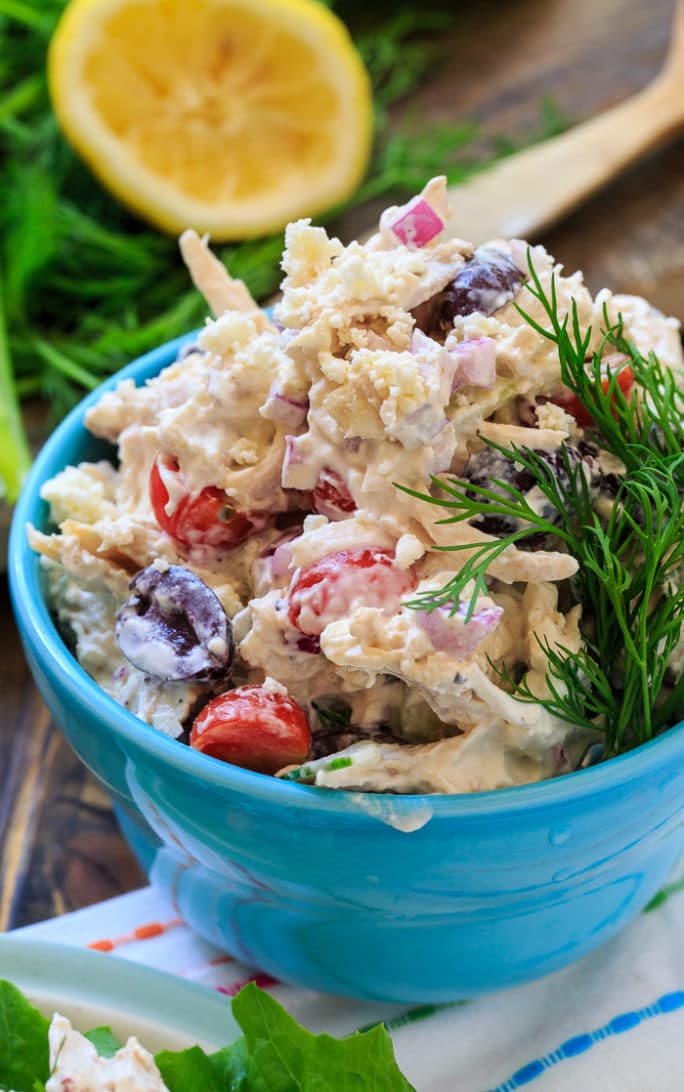 Greek Chicken Salad with tomatoes, cucumbers, feta cheese, and olives.