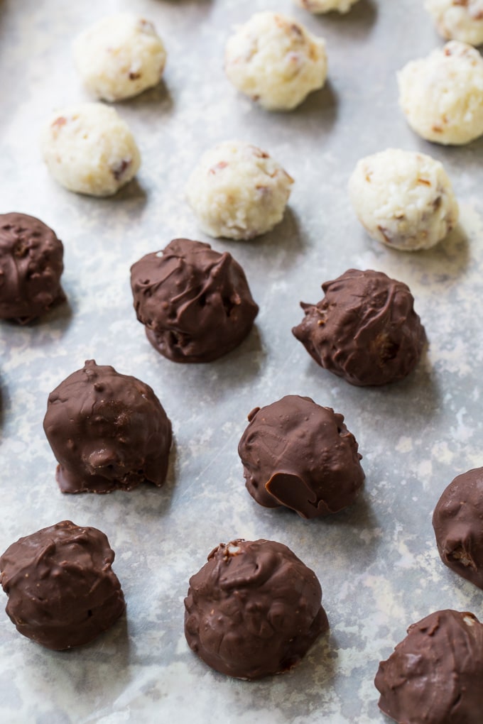 Martha Washington Candy on a baking sheet. Some haven't been dipped in chocolate yet.