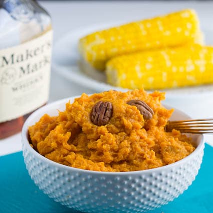 Bourbon Mashed Sweet Potatoes in a white bowl.