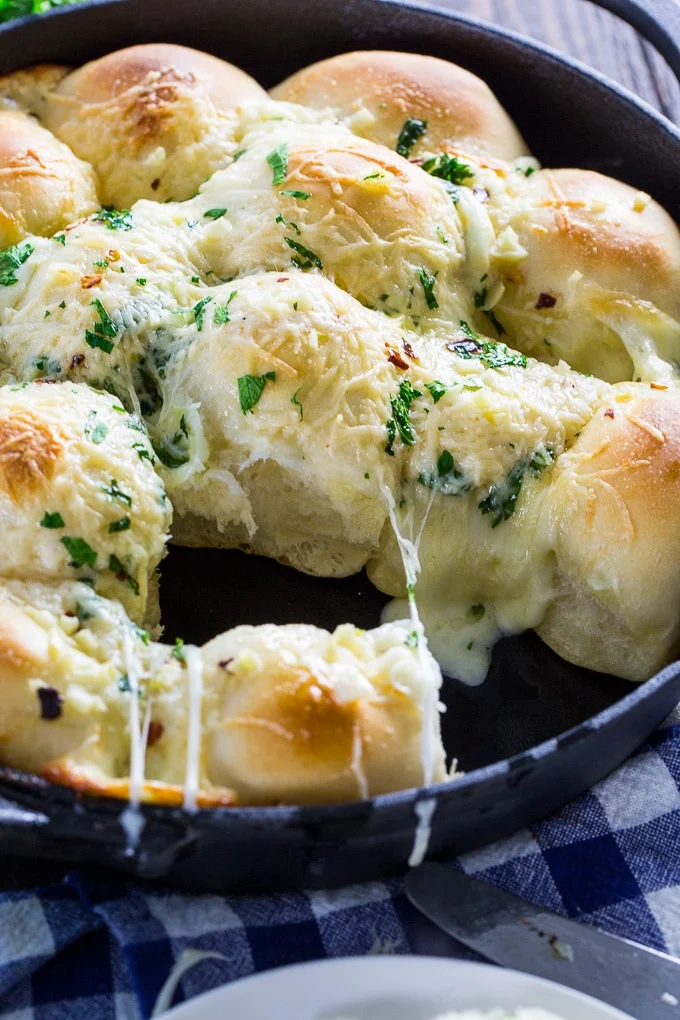 Cheesy Garlic Skillet Rolls stuffed with mozzarella cheese