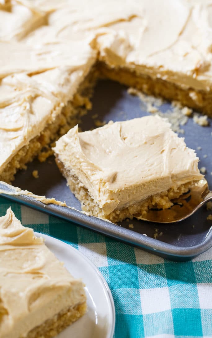 Peanut Butter Sheet Cake with a fluffy peanut butter frosting. Love this for potlucks!