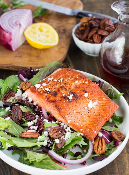 Seared Salmon over Mixed Greens with Dried Cranberries, Feta, and Candied Pecans