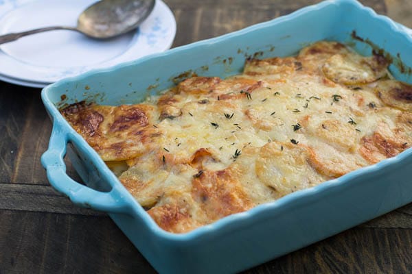 Potato Gratin in a light blue baking dish.