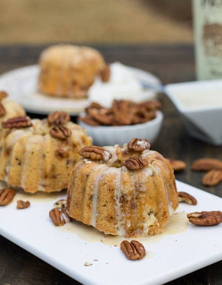 Mini Bundt Cakes with glaze dripping down.