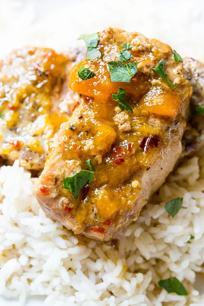 Slow Cooker Spicy Peach Glazed Pork Chops
